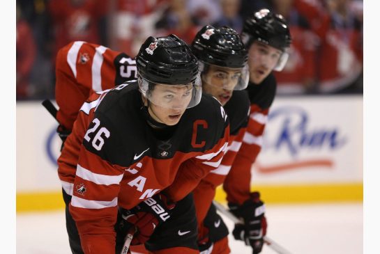 Curtis Lazar, left, and Darnell Nurse, centre, are among the 10 players from Canada's gold-medal junior team a year ago that are playing in the NHL today.