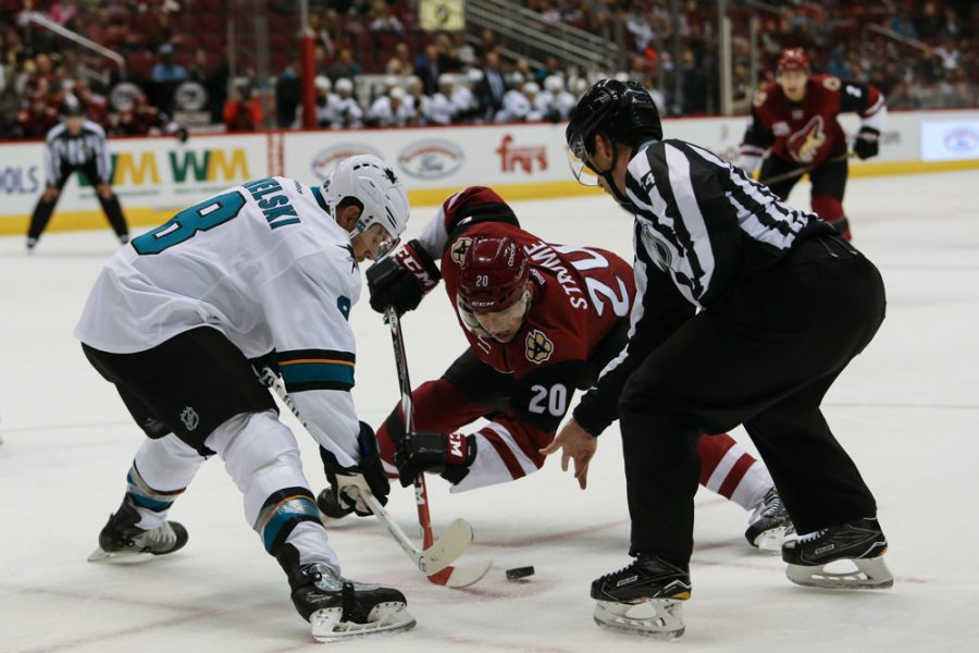 7 October, 2016: Arizona Coyotes center Dylan Strome (20) faces off against San Jose Sharks forward Joe Pavelski (8) during the preseason NHL hockey game between the San Jose Sharks and the Arizona Coyotes at Gila River Arena, Glendale, Arizona. (Photo by Kevin Abele/Icon Sportswire)